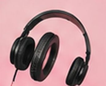 Headphones on a pink background